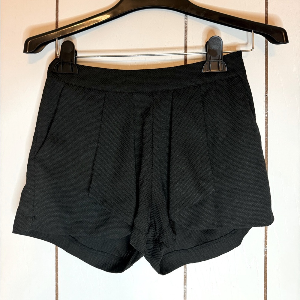 Zinga size S black shorts.